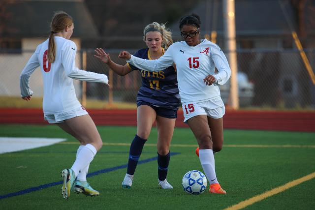 Senior forward Dachelle Carter (15) tries to get past an O'Fallon player in a game played earlier this season at O'Fallon Township High School. Carter scored twice Monday night in a 3-1 win over the Belleville East Lancers at home. (Photo by Brad Piros)