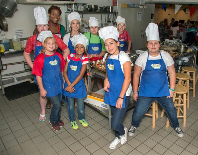 College for Kids students participate in Restaurant Possible, one of many summer camp activities being offered this year. Photo by S. Paige Allen