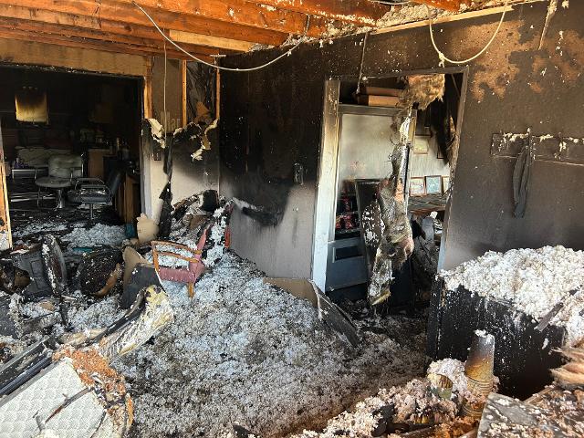 The inside of Tycon Builders and Lindy's Hair Salon were seriously damaged, but because of the fire department efforts and a report from an Alton Police officer the structure of the offices was saved late Tuesday. (Photo by Dan Brannan)