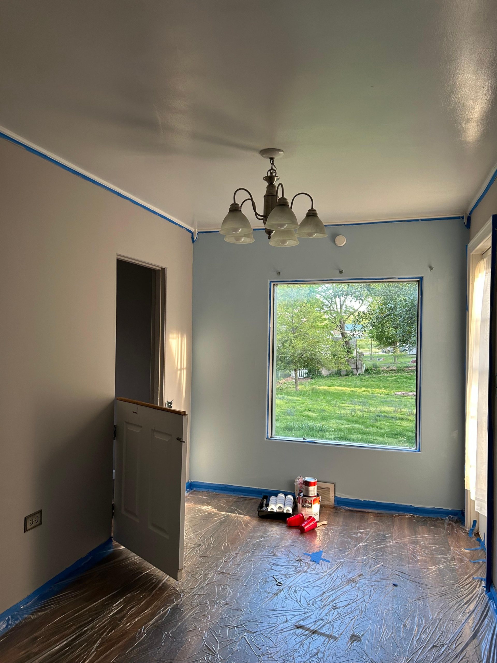 The finished product: refreshed gray walls and an impulsive blue accent wall.
