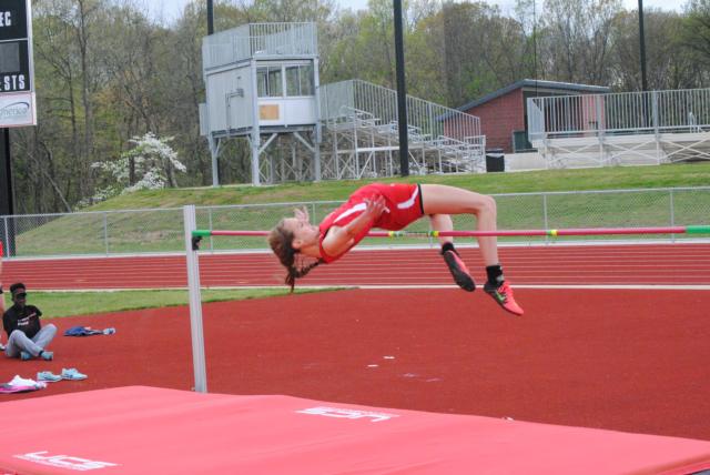 Alton's Katie Mans had a big day on Thursday, clearing 5-7 to smash an Alton girls school high jump record. (Photo by Brent Feeney)