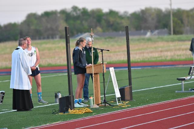 Edwardsville track and field star Elena Rybak gave a moving prayer at the candlelight vigil for Brandon Ahring. (Photo by Dan Brannan)