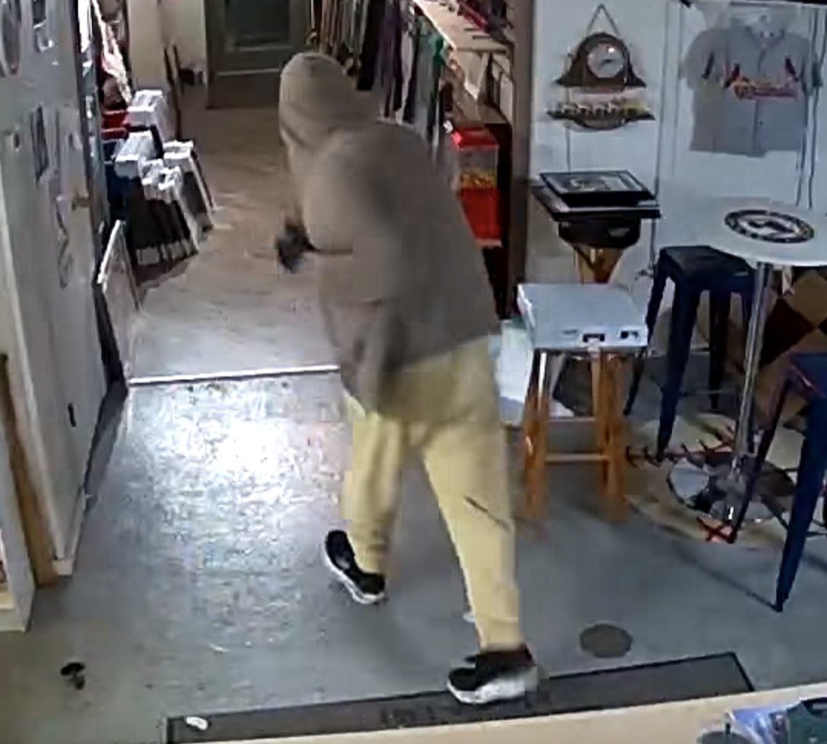 The man departs the GoodSports Sports Cards & Memorabilia shop. Anyone who has any information about this burglary, please contact the Edwardsville Police Department.