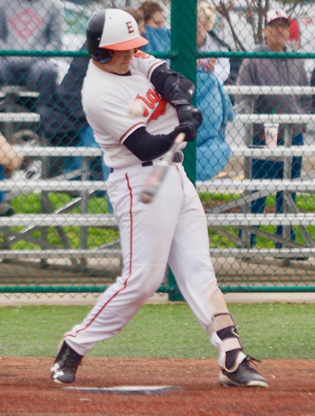 Reid Hendrickson makes contact with a pitch.