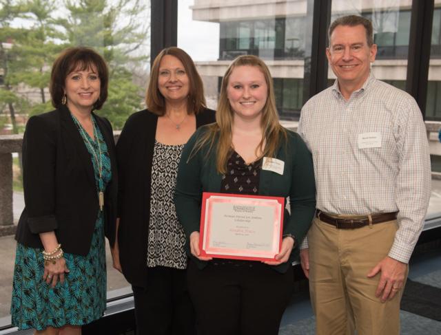 Kendra Tracy, of Alton, earned the inaugural Airman David Lee Jenkins Scholarship. Standing behind her (L-R) are SIUE School of Nursing Dean Laura Bernaix, and scholarship representatives Renee Van Dyke and David Jenkins.