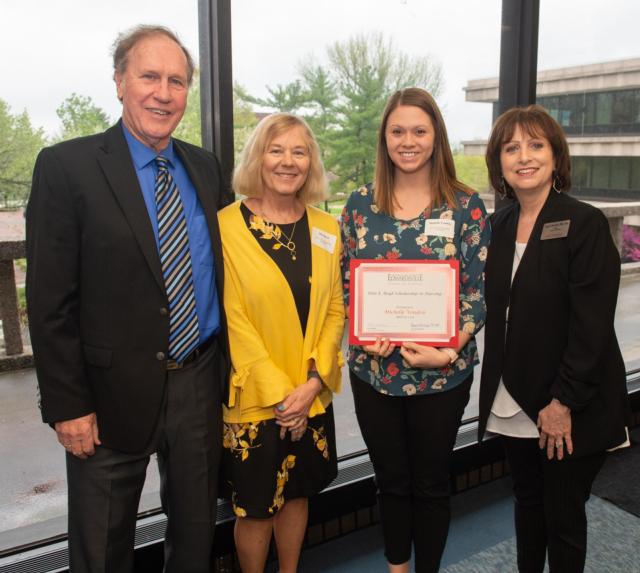 (L-R) Roger and Rita Boyd stand alongside the Rita E. Boyd Scholarship’s inaugural recipient Michelle Voudrie and SIUE SON Dean Laura Bernaix.