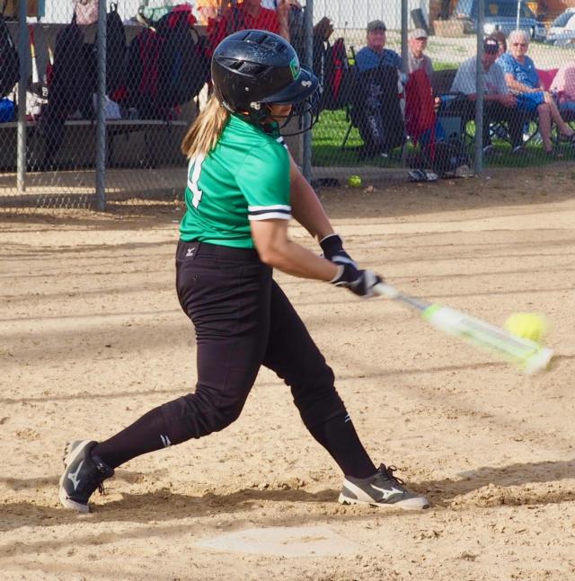 Emily Schmidt connects with a pitch.