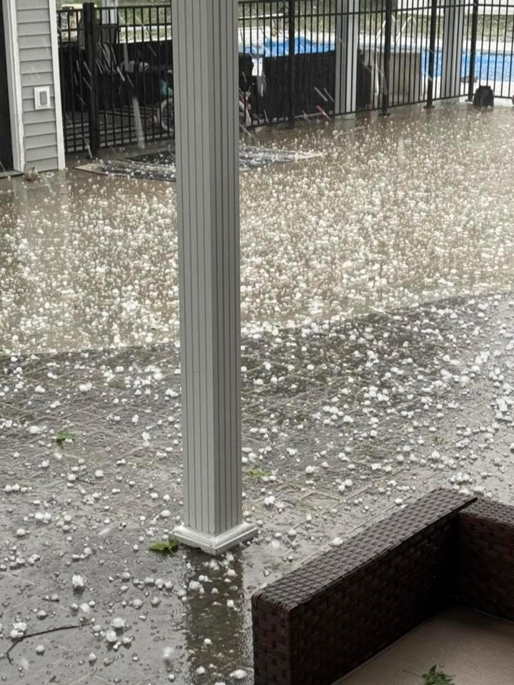 Kristina Woolsey of Jerseyville shows the hail display.