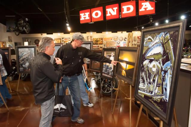 Scott Jacobs talks with Ted’s Motorcycle World Customer about his work at Ted’s Motorcycle World in Alton. (Photo by Chuck Sheets)