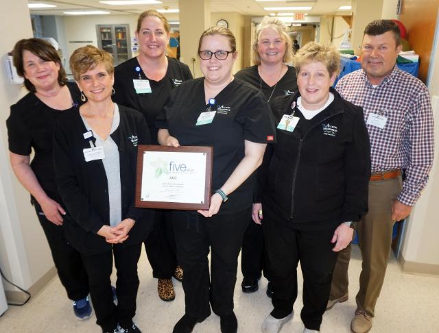 HMI team members with Dave Braasch are, left to right, Grace Mormino, manager Sue Walker, Jennifer Hauschild, Angela Kramer, Laura Bastin and Joellen Corona.