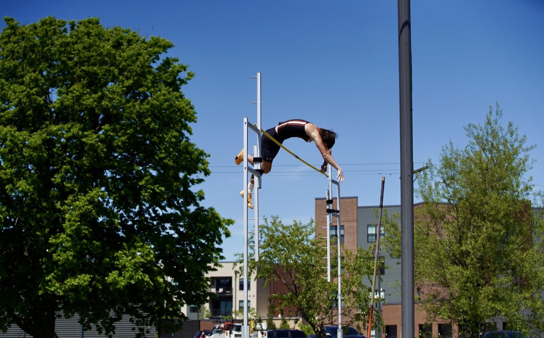 Parker Owens in the pole vault in the meet on Saturday in Edwardsville. (Photo by Mike Baxter).