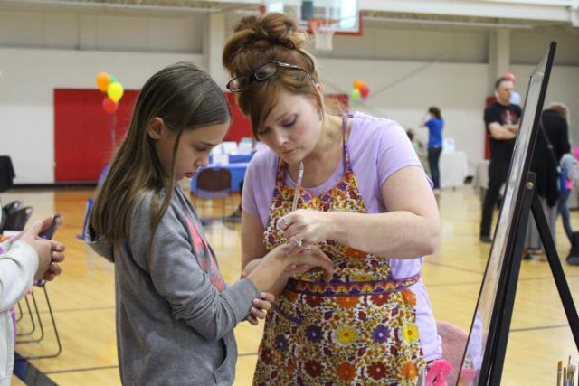 This visitor at Healthy Kids Day opted for a hand painting. 
