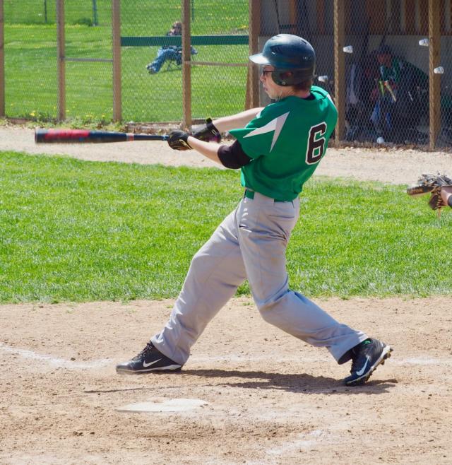 Kyle Waters knocks a single to the outfield.