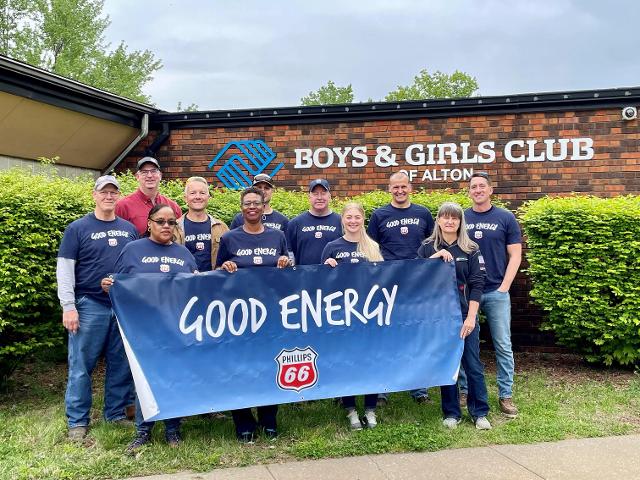 Wood River Refinery employees spend the morning helping at the Boys & Girls Club of Alton.