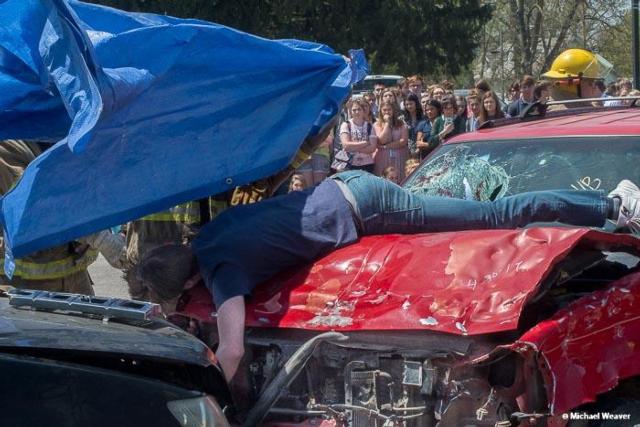 The mock crash done this past week at Jersey Community High School was a powerful event. Shown are images from the mock crash with students playing roles of victims. (Photos by Michael Weaver)