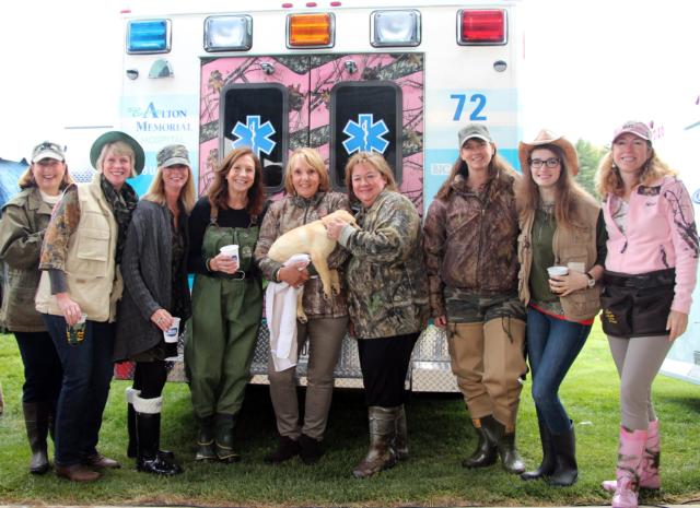 Jack the puppy got plenty of attention from the ladies at the seventh annual Duck Pluckers, Deer Skinners and Fish Hookers Ball held recently by the Alton Memorial Health Services Foundation. Jack raised $1500 in the live auction. Pictured from left to right are Cindy Lewis, Kelli Lauschke, Cass Funkhouser, Nancy Simpson, Gaye Julian, Sandy Lauschke, Liz Buck, Jane Cavin and Martha Morse