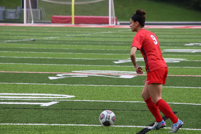 Emily Baker (above) scored a hat trick against the Belleville East Lancers to close out the regular season. 