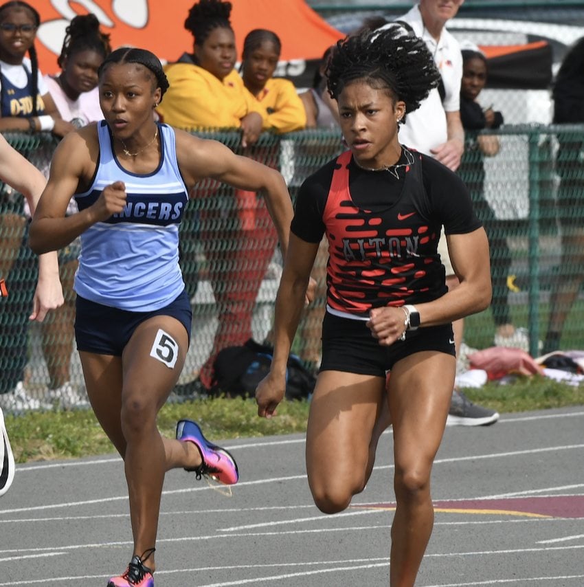 Alton's Rayna Raglin was a triple winner on Wednesday in the Southwestern Conference Meet in the 100, 200 and 400 meters.