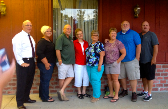  The Pohlman family are, from left, to right, Phil, Kyle, Greg, Joan (Mom), Stephanie, Jan, Jim and Reg. Ed, the father of the family and Joan’s husband, died in 2007. Jim died in 2014.