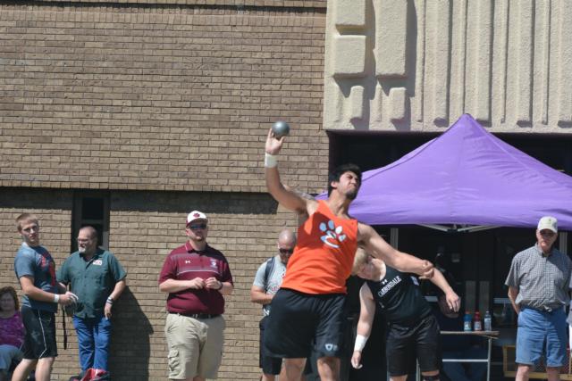 A.J. Epenesa is shown in the shot put on Saturday at Collinsville. He won the discus, once again topping 200 feet, and placed second in the shot put. (Photo by Dan Brannan)