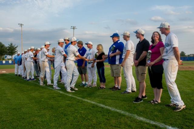 Seniors are congratulated for their baseball careers at Jersey on Wednesday night with parents. (Photos courtesy of Michael Weaver)