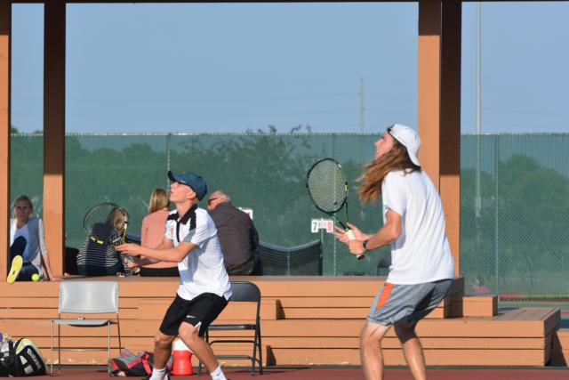 Luke Motley and Erik Weiler combine in doubles for Edwardsville. (Photo by Dan Brannan)