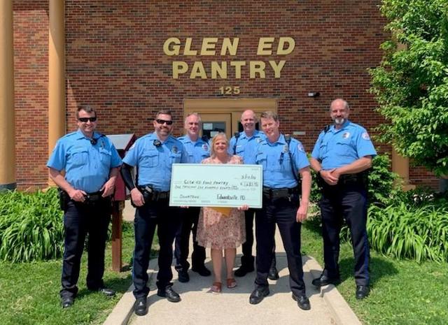 Glen-Ed Food Pantry receives check from the Edwardsville Police Department.