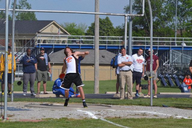 Edwardsville's Neil Gutterman releases the discus in the Southwestern Conference Meet on Wednesday. (Photo by Dan Brannan)
