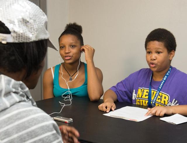 Digital East St. Louis participants Aanyla Edwards and Nathaniel Brewster learn about the history of East St. Louis during an interview at the Clyde C. Jordan Senior Center in 2016.