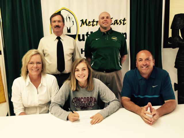 Emilee Marcuzzo signs her letter of intent to attend Concordia College.