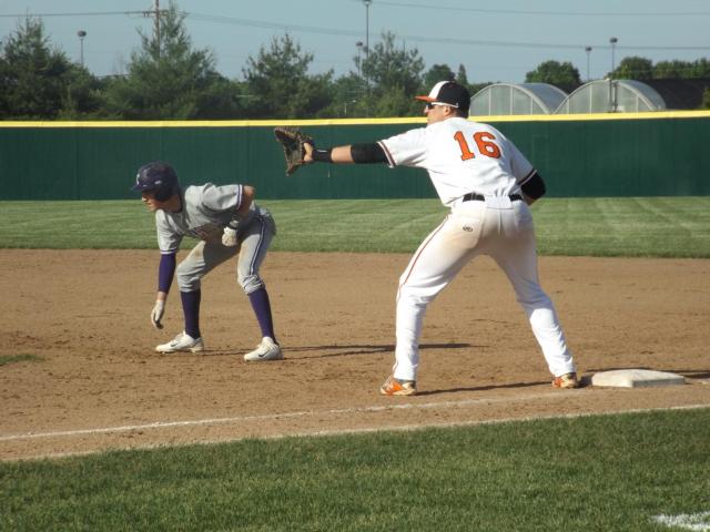 Bailey Zimmer holds a runner on first base on Tuesday afternoon. (Photo by Brent Feeney)