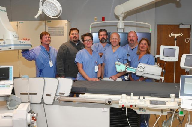 Alton Memorial’s Heart & Vascular Center staff with the new equipment in the cath lab.