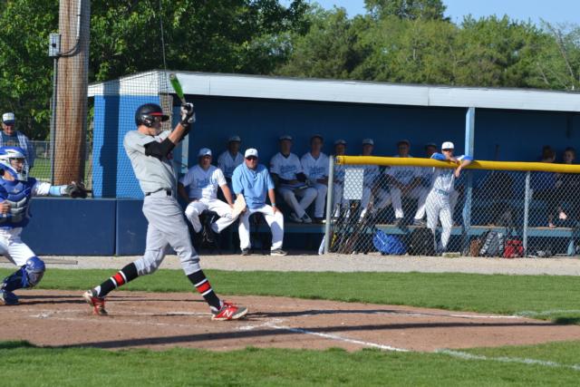 Hudson's game-winning cut for a double late in the Alton-Jersey game. (Photo by Dan Brannan)
