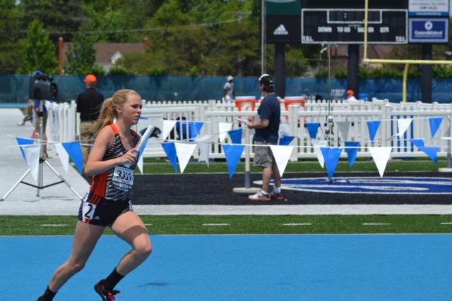 Bailey McGuire ran the anchor leg for Edwardsville's 4 x 800 relay on Friday. (Photo by Dan Brannan)