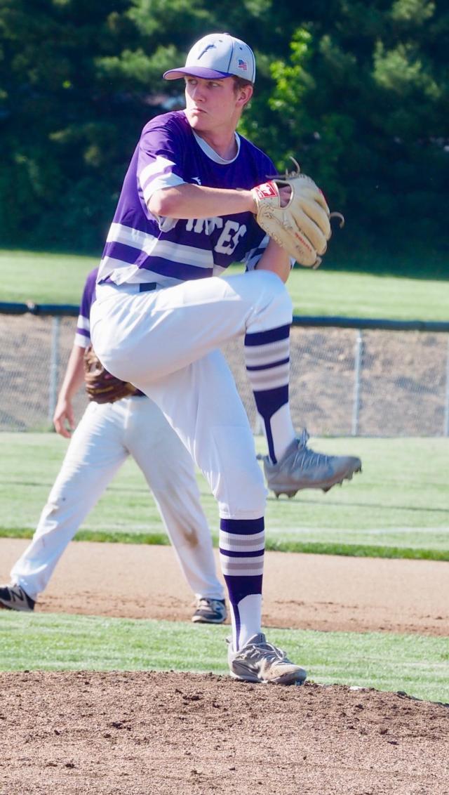 Phillip Reinhardt winds up for a pitch.