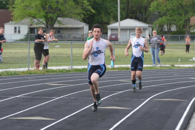 Jersey's Kevin Hall takes the baton in the 4 x 100 relay.