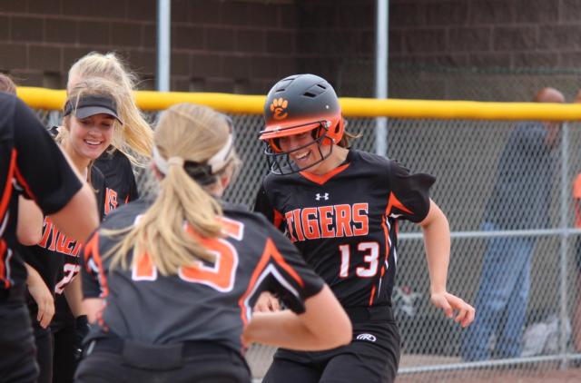 Sarah Hangsleben of Edwardsville celebrating after a home run.