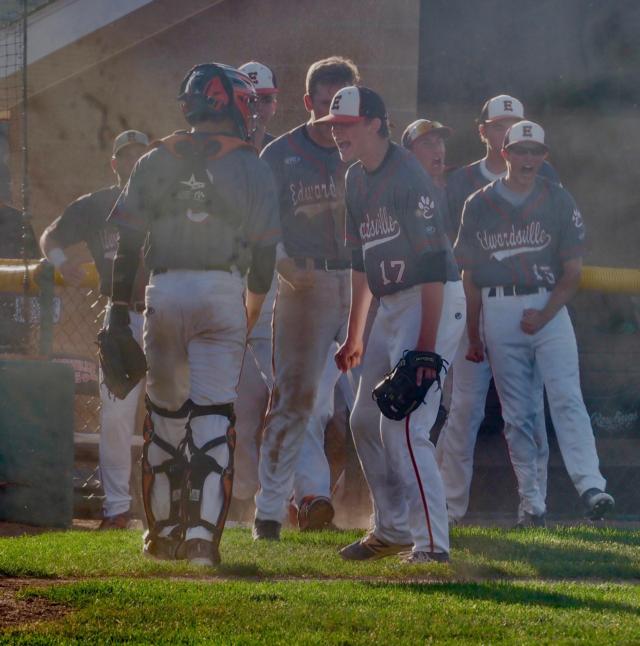 Matthew Boyer, Dalton Wallace and the rest of the Tigers celebrate after getting a 6-4-3 double play to extend the game in to extra innings.