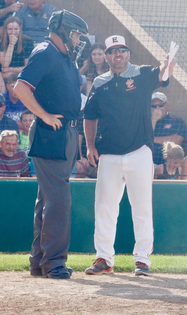 Tim Funkhouser argues a reversed call to the home plate umpire.