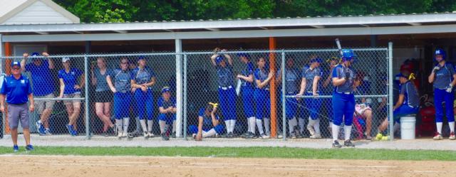 Marquette's players watching from the dugout.