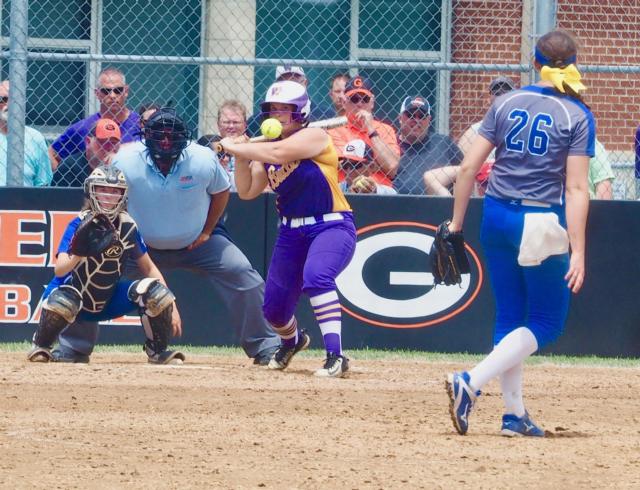Meghan Schorman delivers a pitch to Rylie Yard.