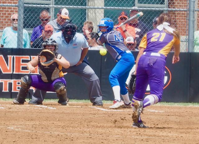 Payton Long delivers a pitch to Taylor Whitehead.