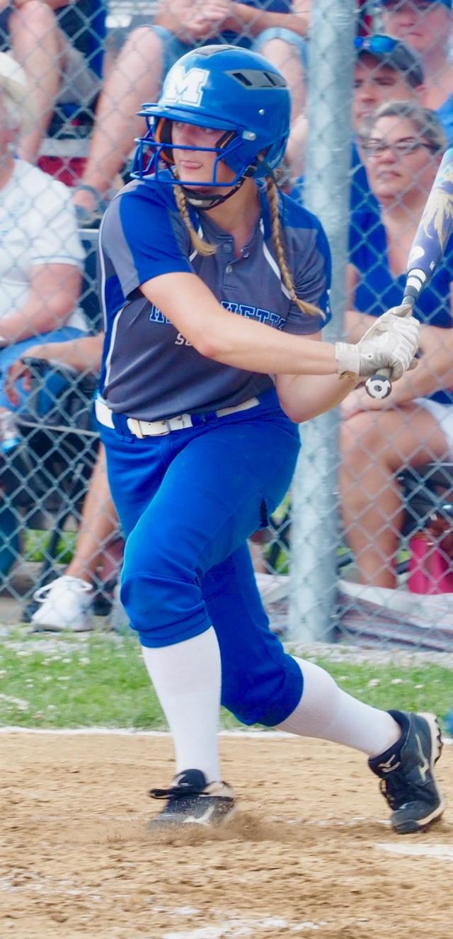 Jada Johnson swings at a pitch.