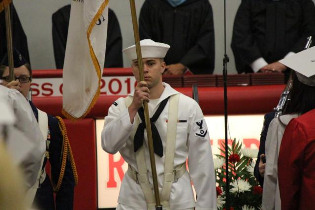 Petty Officer 3rd Class Tanner Wilson surprised his sister, Mariah Wilson, by standing in the AFJROTC Color Guard. 