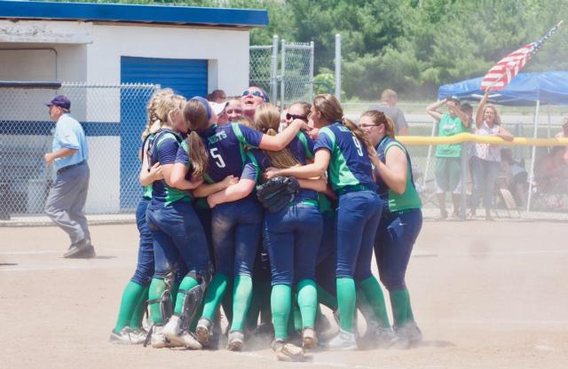 The Hatchets celebrate their victory in the circle.