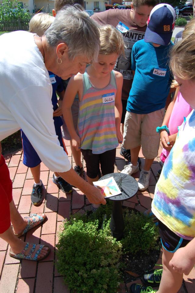 Learning how to tell time with a sundial