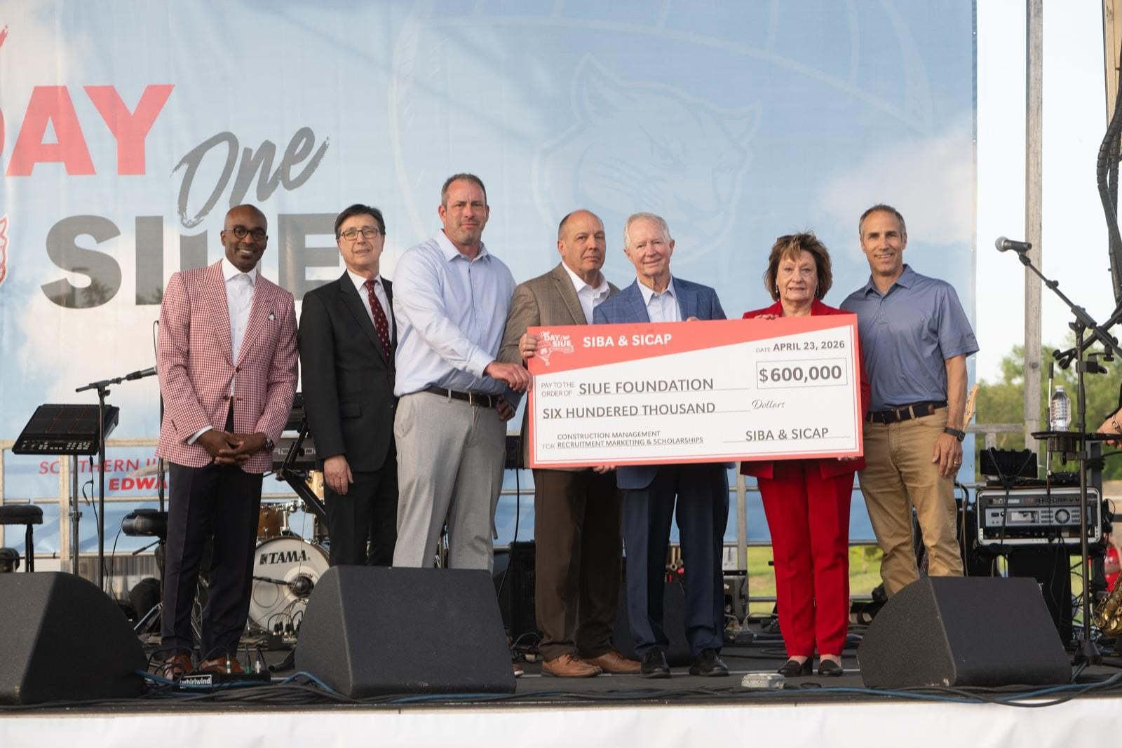 (From Left to Right): SIUE Chancellor James Minor; Cem Karacal, Ph.D., dean of the School of Engineering at SIUE; Tom Lavelle, SIBA board member; Jeff Limbaugh, SIBA past president; Bruce Holland, SICAP administrator and SIBA board member; Donna Richter, CEO of SIBA and administrator for SICAP; and Scott Harding, SIBA board member, during a check presentation at the One Day, One SIUE Celebration event recognizing a $600,000 commitment to SIUE&rsquo;s construction management program.