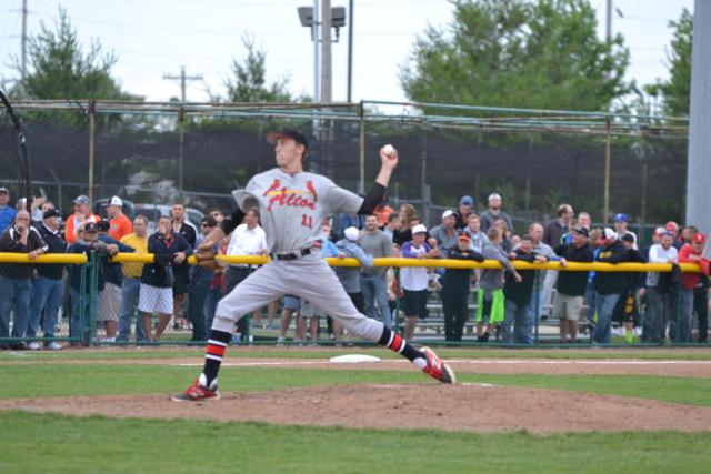 Alton fireballer Bryan Hudson lets loose of one of his fastballs against Edwardsville on Monday night. (Photo by Dan Brannan)