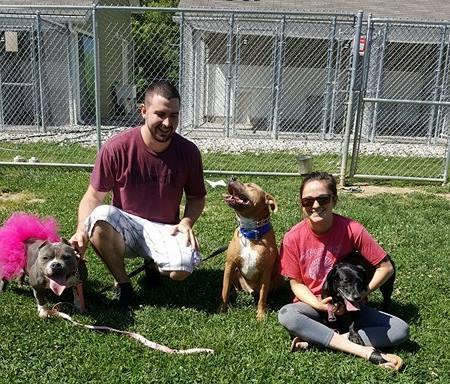 April, donning her pink tutu, along with her new family.