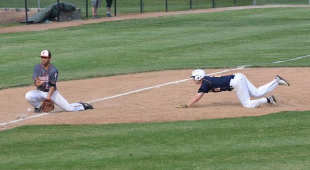 Edwardsville's Aaron Jackson makes a play at third base during the Tigers game against O'Fallon. (Photo by Dan Brannan)